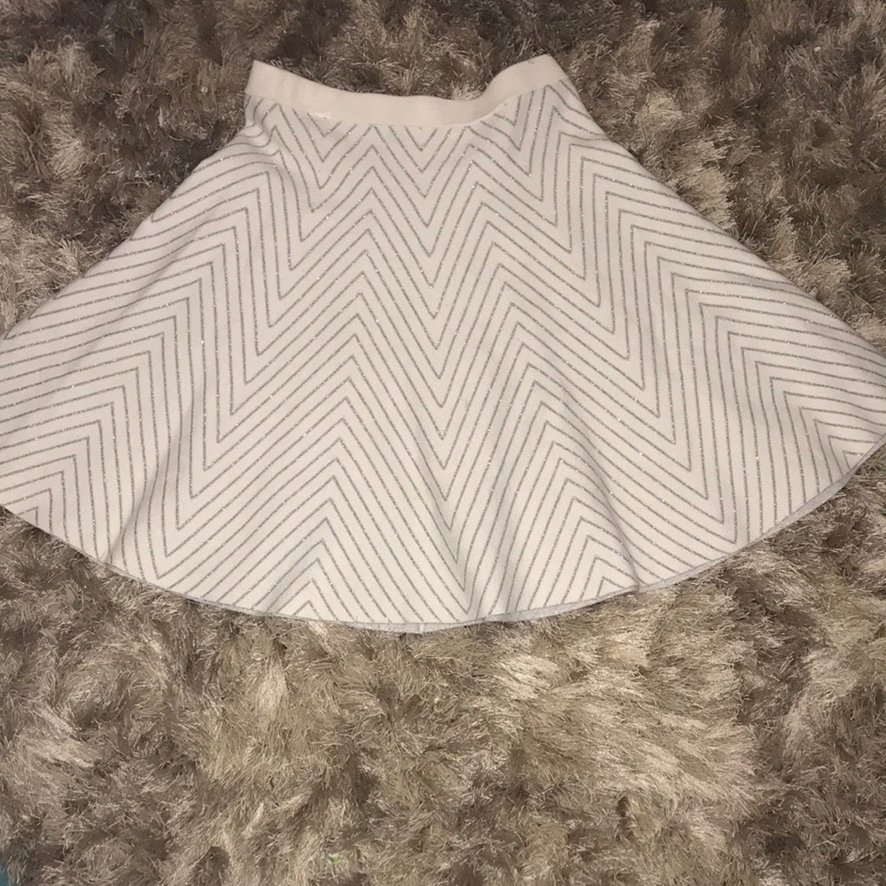 A Lined White Skirt with Silver Metallic lines